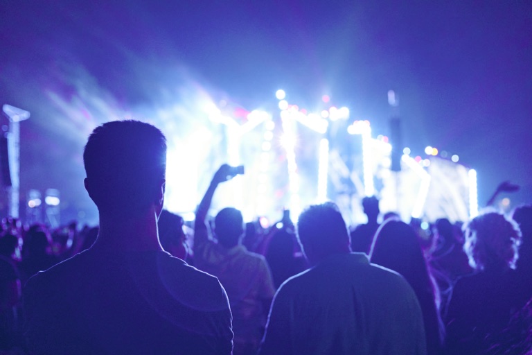 Friends enjoying a live event together
